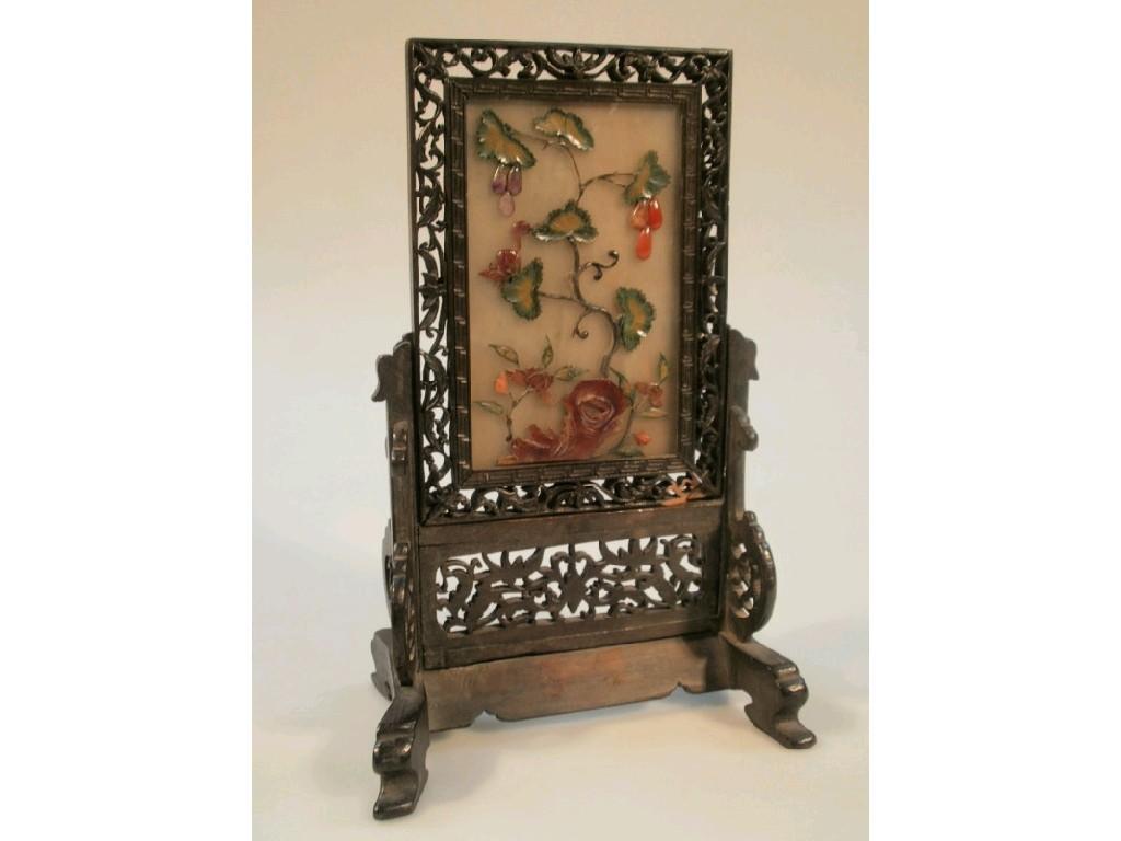 Appraisal: A small Chinese carved and pierced hardwood table screen set