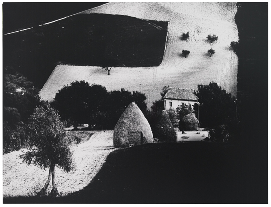 Appraisal: GIACOMELLI MARIO - Untitled landscape with haystacks Silver print x