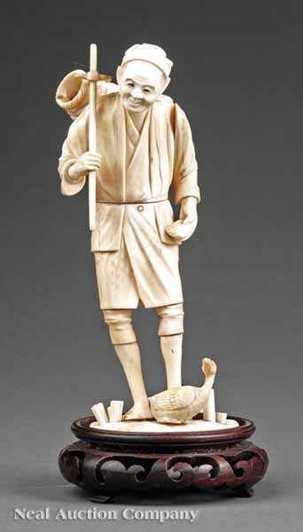 Appraisal: A Japanese Carved Ivory Sectional Okimono of Clam Digger Meiji