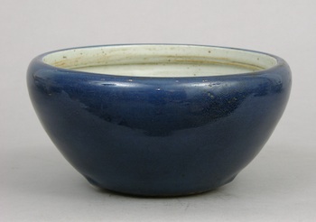 Appraisal: An Oriental Bowl with Dark Blue Glaze A Bark blue