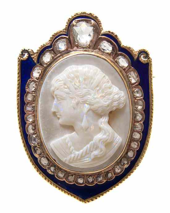 Appraisal: A Victorian Yellow Gold Diamond Enamel and Carved Opal Cameo