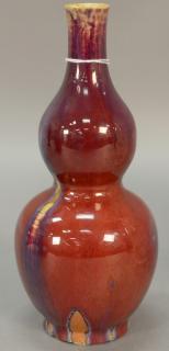 Appraisal: Chinese flambe glazed porcelain double gourd vase oxblood red suffused