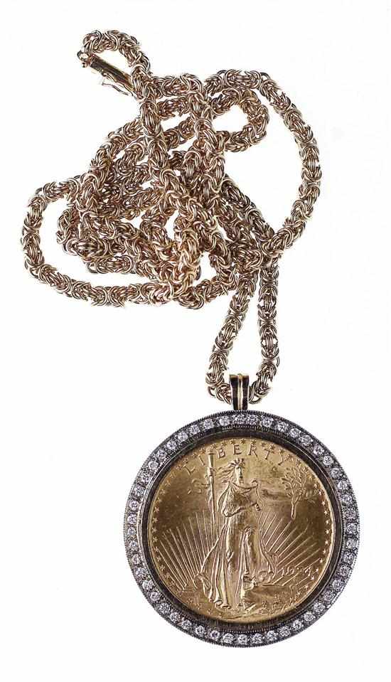 Appraisal: Gold dollar pendant on chain twenty dollar Liberty gold coin