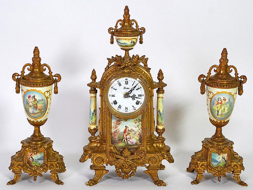 Appraisal: FRENCH STYLE GILT METAL AND PORCELAIN MOUNTED THREE PIECE CLOCK