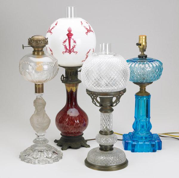 Appraisal: LIGHTING GROUP Includes four lamps th C oil lamp with