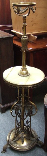 Appraisal: A French gilt metal standard lamp with green onyx circular