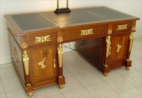 Appraisal: HIGHLY ORNATE EGYPTIAN REVIVAL STYLE DESK AND CHAIR Applied masquerons