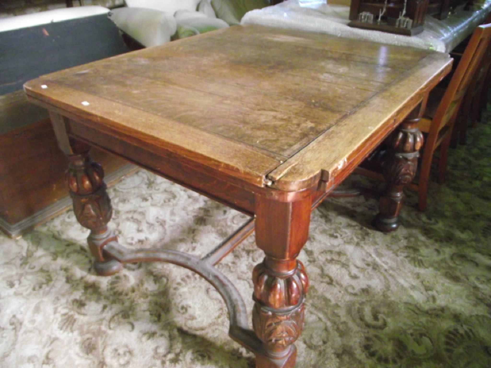 Appraisal: A s oak draw leaf dining table raised on four