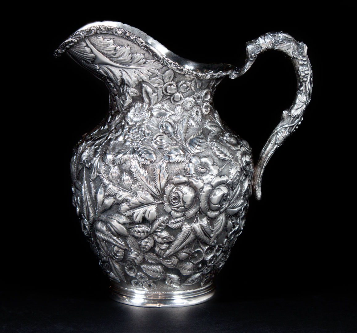 Appraisal: Stieff Rose repousse sterling silver pitcher late th early th