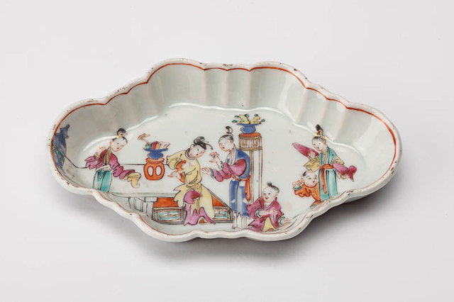 Appraisal: A CHINESE CANTON FAMILLE ROSE LOBED SPOON STAND decorated with