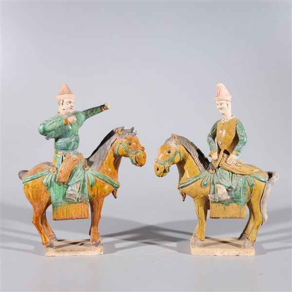 Appraisal: Pair of Ming Dynasty style sancai glazed ceramic riders atop