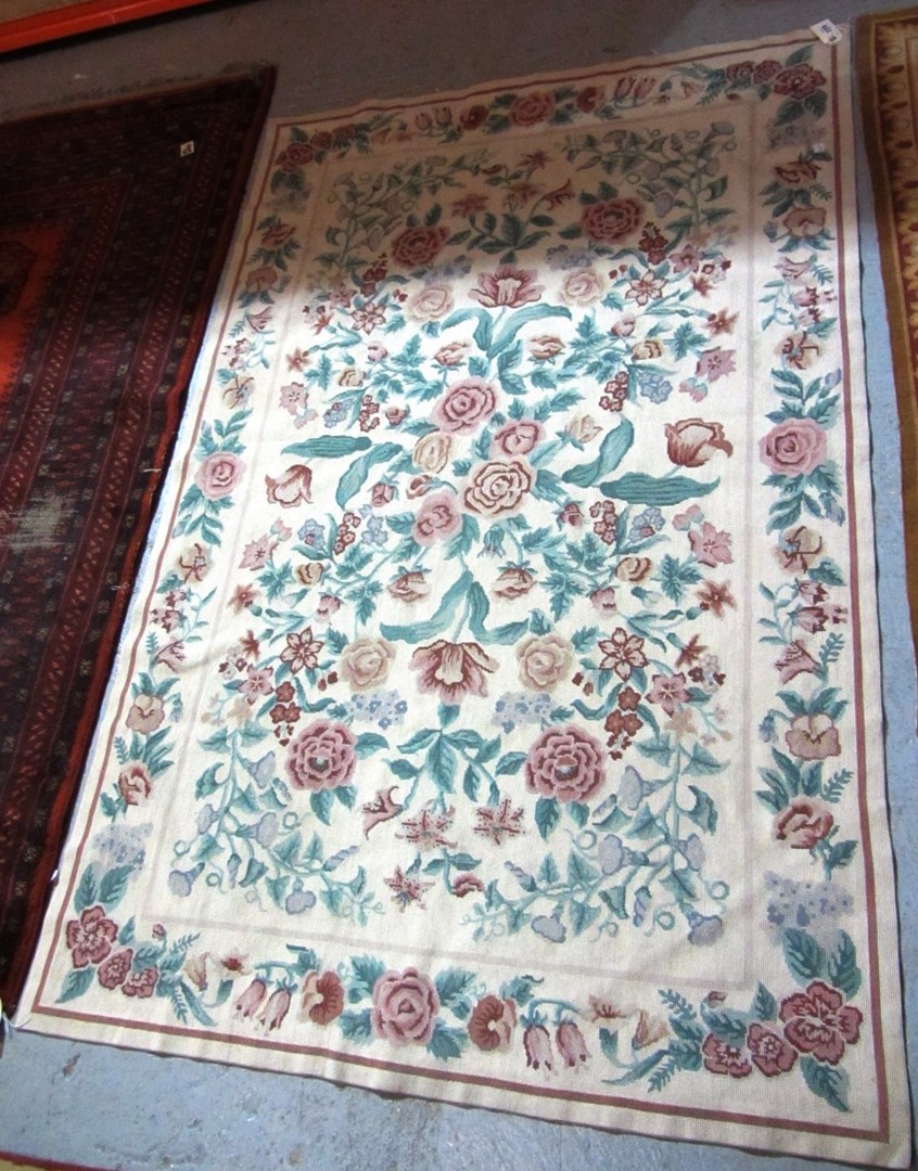 Appraisal: A th century floral needlework rug