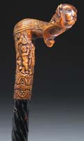 Appraisal: CARVED WOOD HANDLED CANE The L shaped handle has a