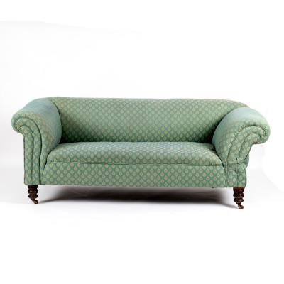 Appraisal: A Victorian Chesterfield sofa the scroll arms with single drop