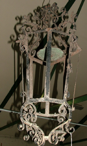 Appraisal: A French black painted scroll decorated wrought iron hexagonal lantern