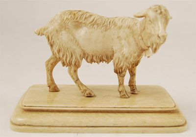 Appraisal: A th century carved model of a goat standing on