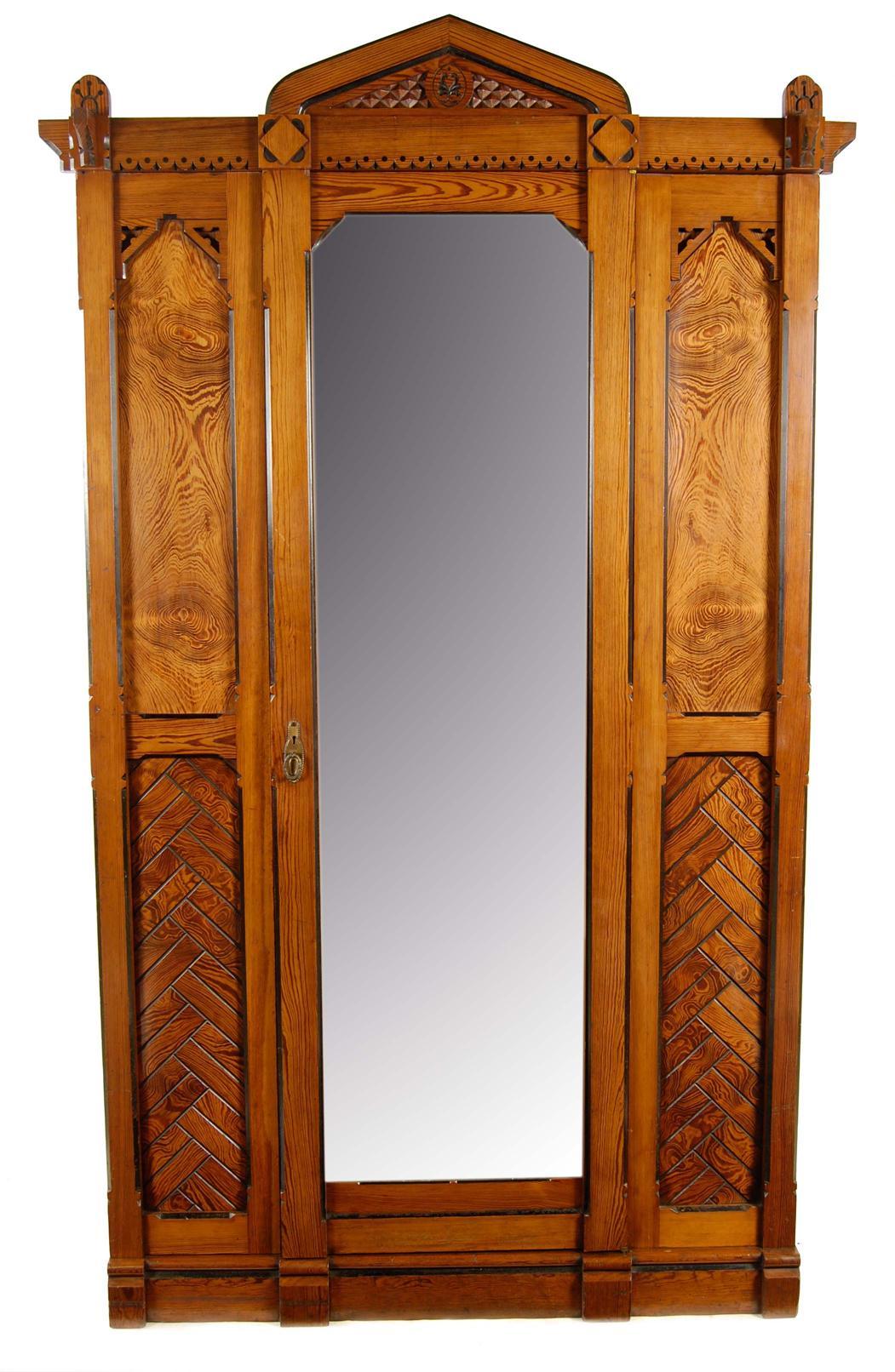 Appraisal: A late Victorian pitch pine wardrobe