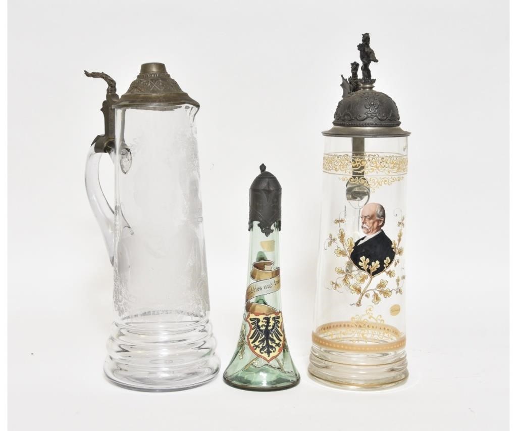 Appraisal: Three glass steins one large stein with portrait of Bismark