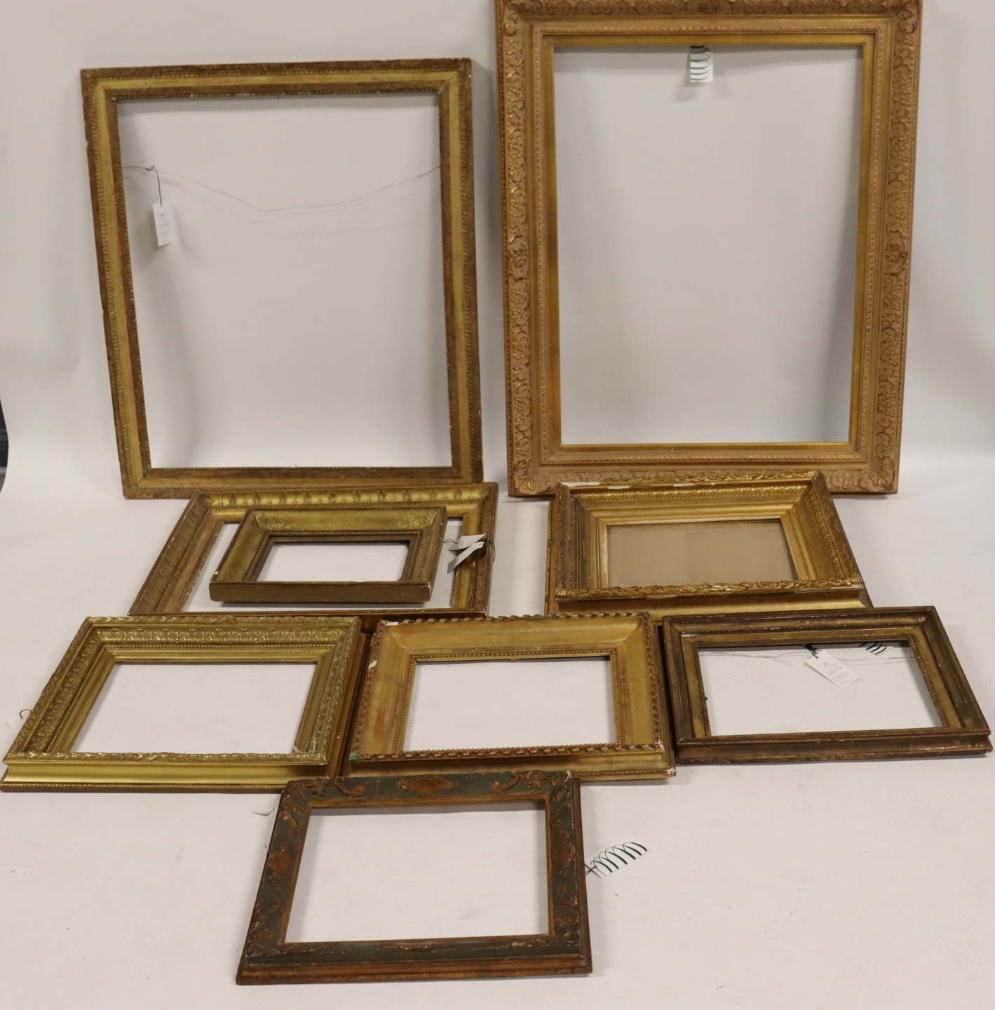 Appraisal: GROUP OF ORNATE GILT WOOD FRAMES To include frames with