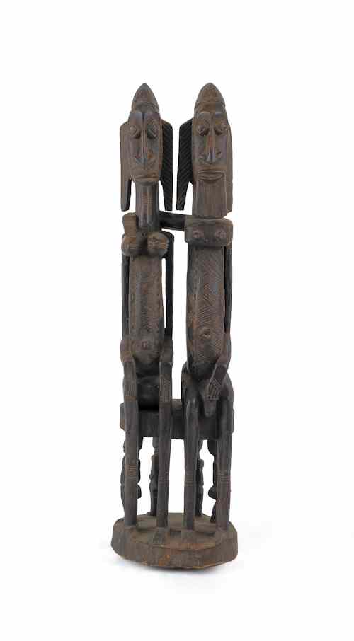 Appraisal: Two African carved and painted wood figures h and h