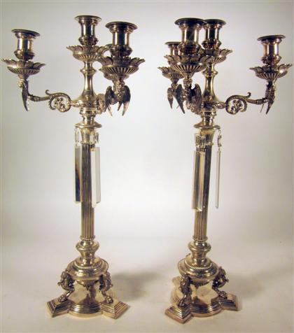 Appraisal: Pair of Continental Empire style four light three branch silverplated