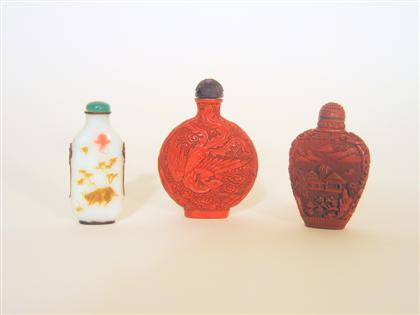 Appraisal: Three Chinese snuff bottles two cinnabar lacquer and one glass