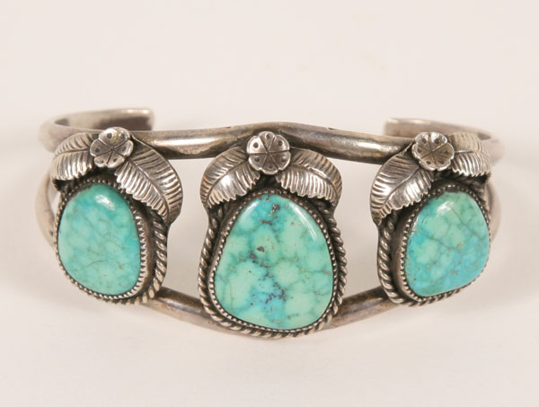 Appraisal: Native American silver and turquoise bracelet with three polished stones