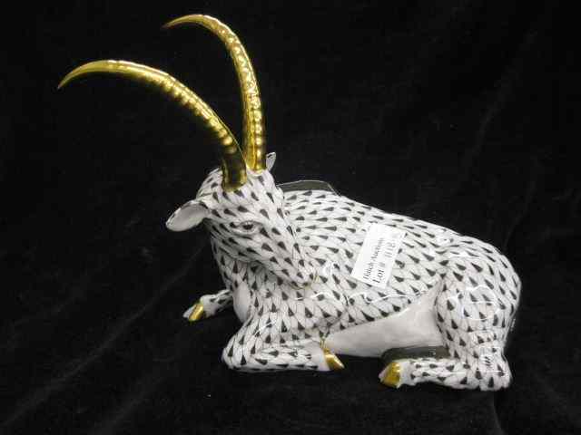 Appraisal: Herend Porcelain ''Fishnet'' Figurineof a seated antelope black fishnet ''