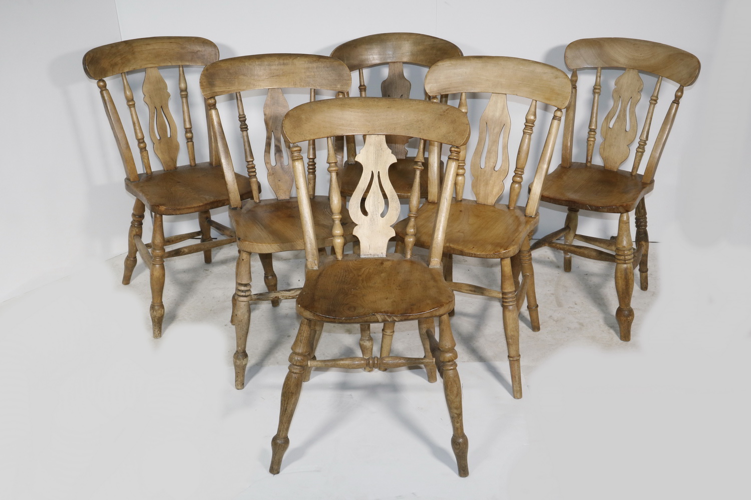 Appraisal: ENGLISH ELMWOOD SLAT BACK DINING CHAIRS English refinished elmwood spindle