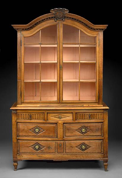 Appraisal: A Louis XVI fruitwood buffet deux corps fourth quarter th