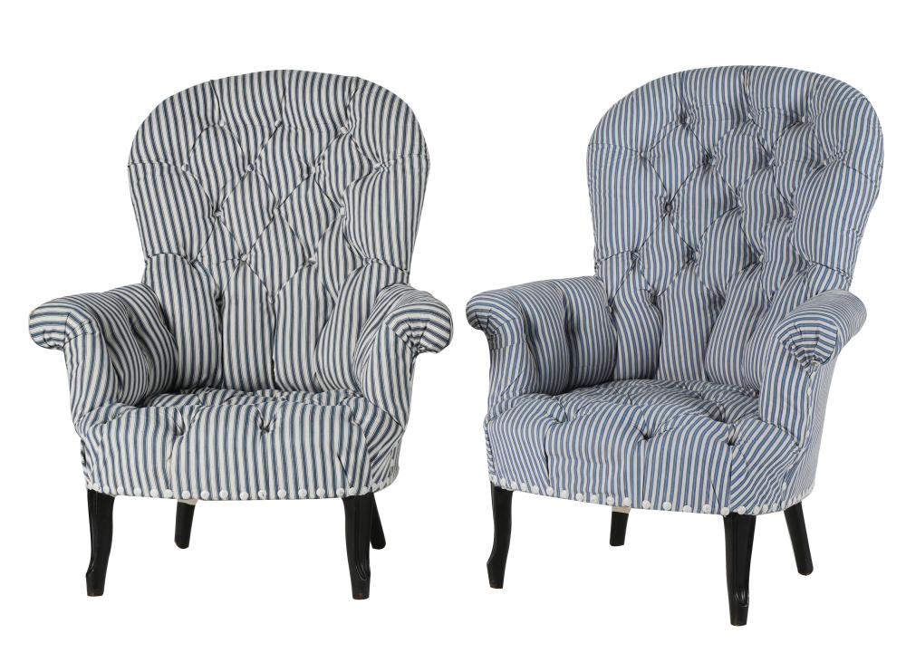 Appraisal: PAIR OF VICTORIAN-STYLE TUFTED ARMCHAIRSthe front legs raised on casters