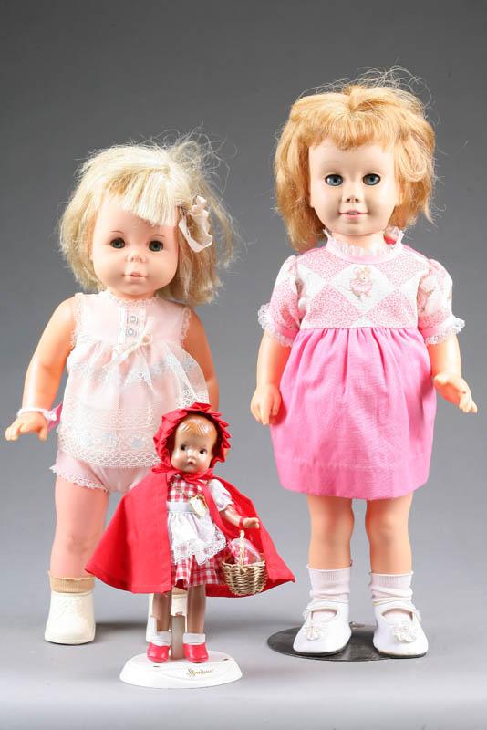 Appraisal: THREE DOLLS Mattel st step baby doll h A Mattel