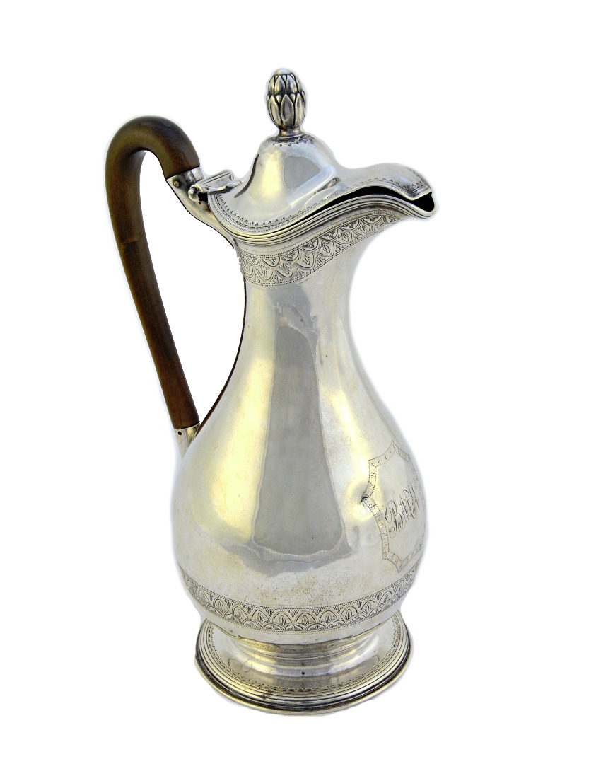 Appraisal: A George III silver hot water jug of baluster form