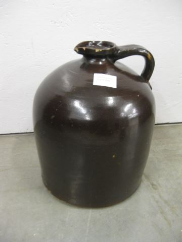 Appraisal: Brown Stoneware Jug pour spout some chips