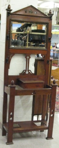 Appraisal: WALNUT HALLSTAND English early th century with rectangular mirror and