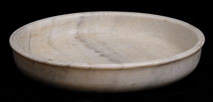 Appraisal: CARVED ALABASTER LARGE BASIN The raised sides with grooved slightly