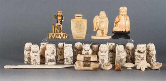 Appraisal: Group of Japanese carved bone and ivory articles including netsukes