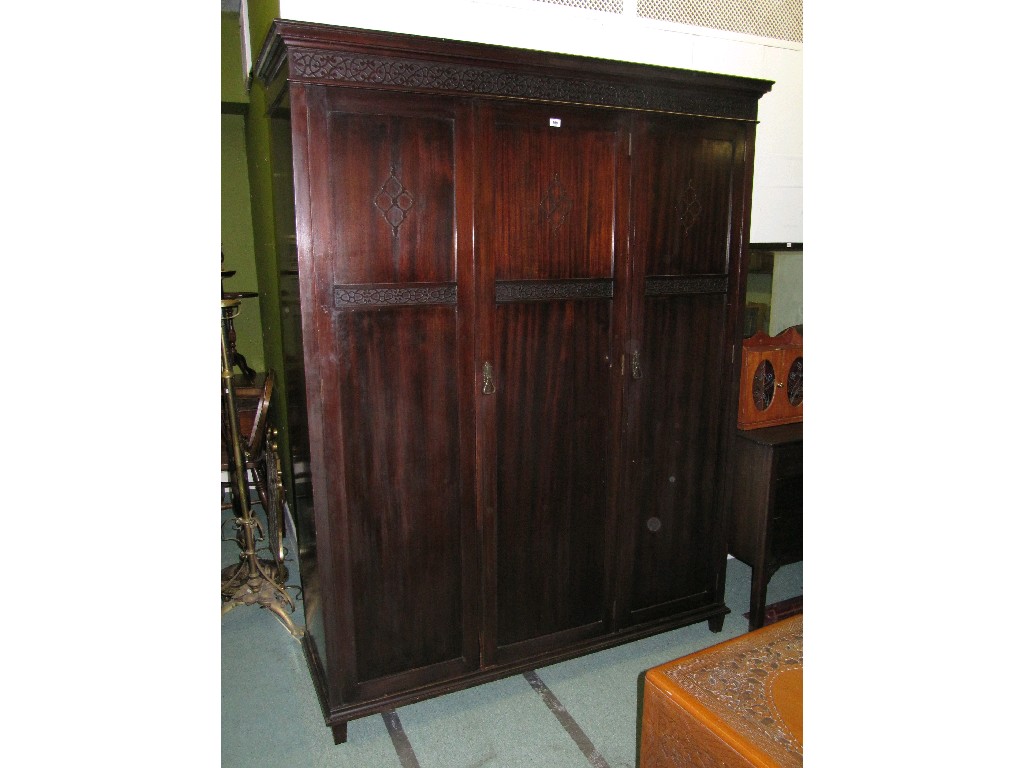 Appraisal: Edwardian mahogany bedroom suite with blind fret decoration comprising triple