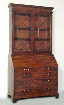 Appraisal: A GEORGE III MAHOGANY BUREAU BOOKCASE the moulded cornice over