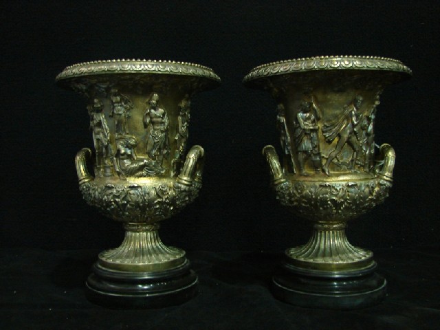 Appraisal: A pair of twin handled urn form wine coolers in