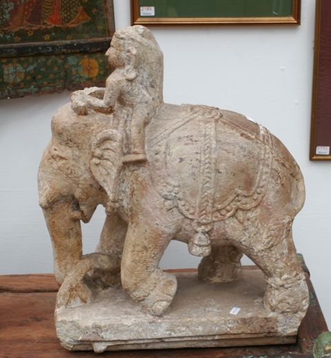 Appraisal: A carved sandstone elephant and rider architectural detail th century