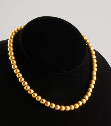 Appraisal: KY mm beads on gold braided chain Invisible clasp '