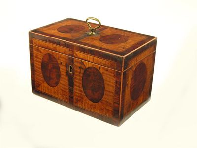 Appraisal: A George III mahogany sycamore and rosewood banded rectangular tea