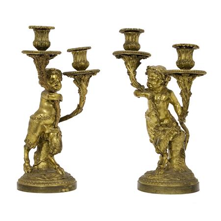 Appraisal: Companion Pair of Gilt-Bronze Bacchanalian Two-Light Candelabra Estimate -