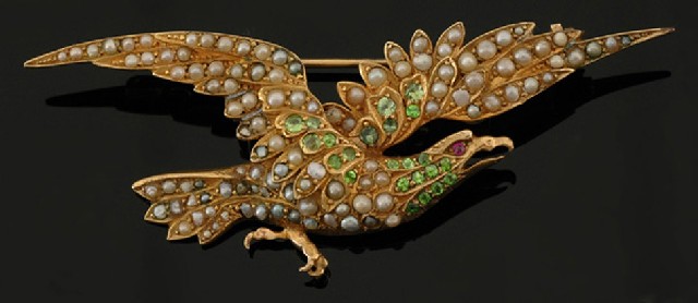 Appraisal: An antique gem set eagle brooch Set with seed pearls