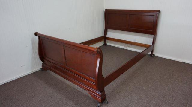 Appraisal: Modern era 's Mahogany Queen size sleigh style bed with