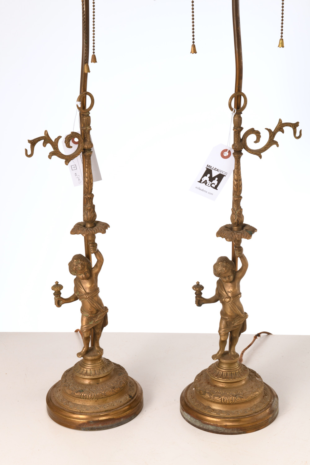 Appraisal: PAIR LOUIS XV STYLE BRONZE PUTTO LAMPS th th c