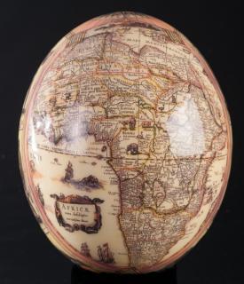 Appraisal: African Map Decoupage Ostrich Egg Decoupage ostrich egg with a