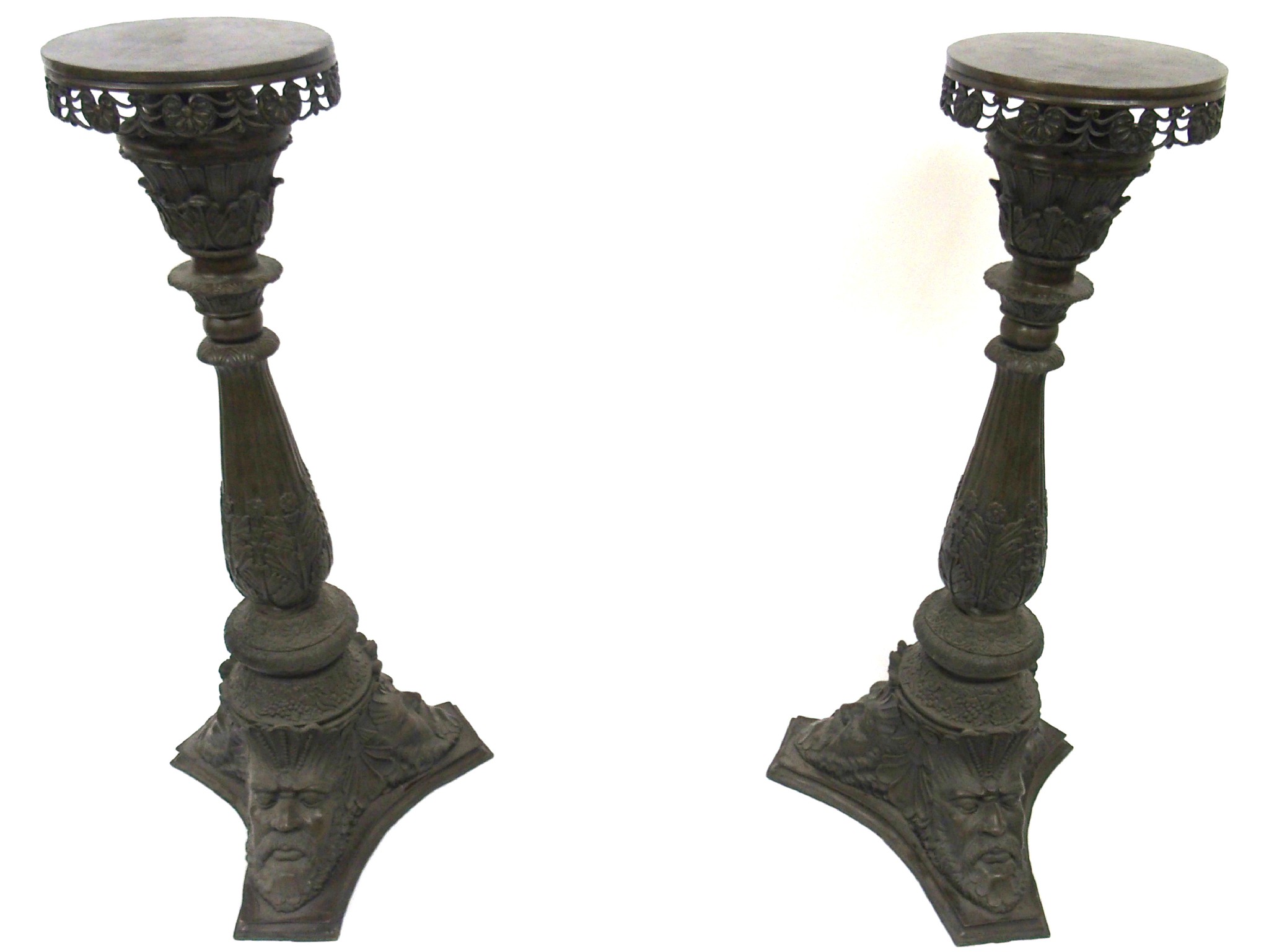 Appraisal: A pair of bronze pedestalswith pierced shell aprons above baluster