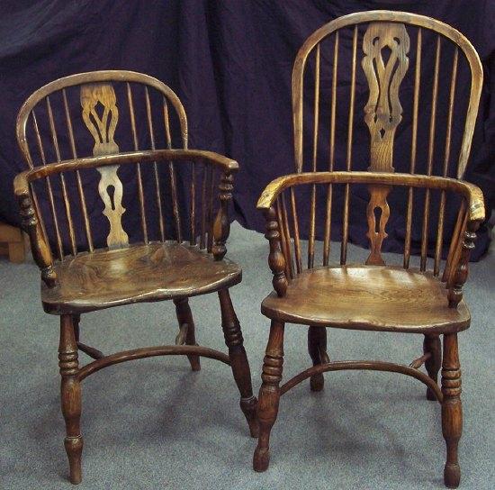 Appraisal: Two stick and pierced splat back armchairs both with solid